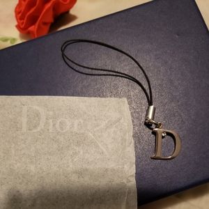 Christian Dior letter "D" accessory